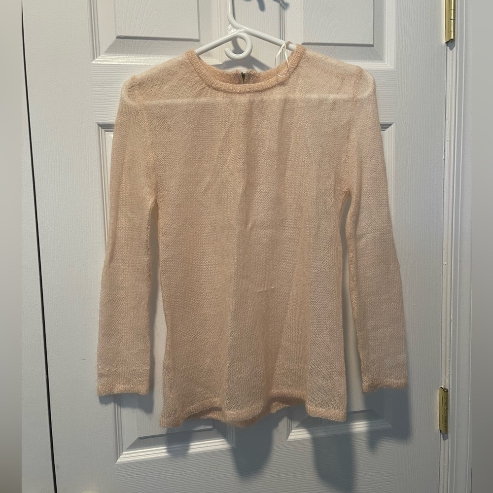 Woman’s sweater.